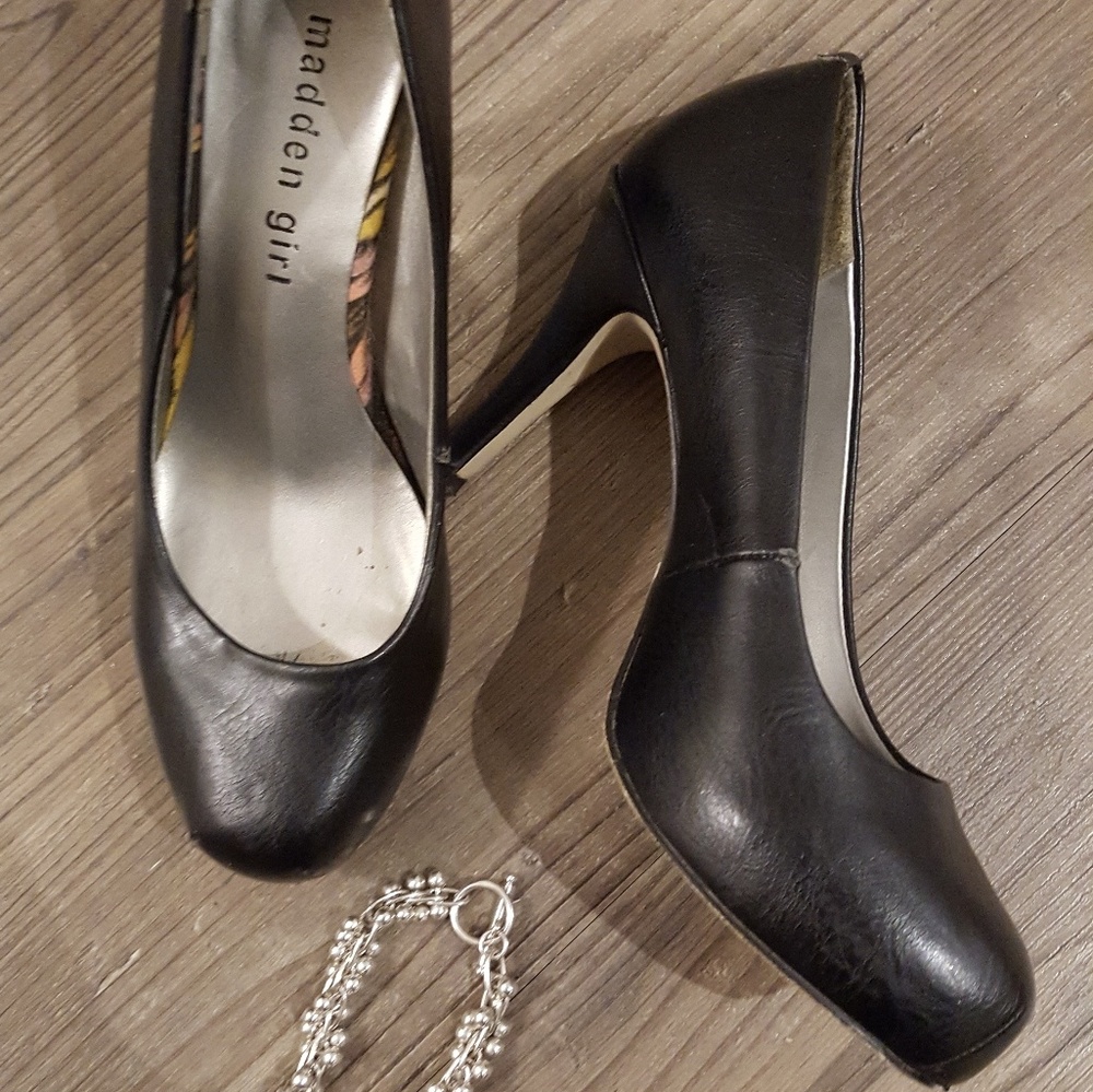 Black platform pumps
